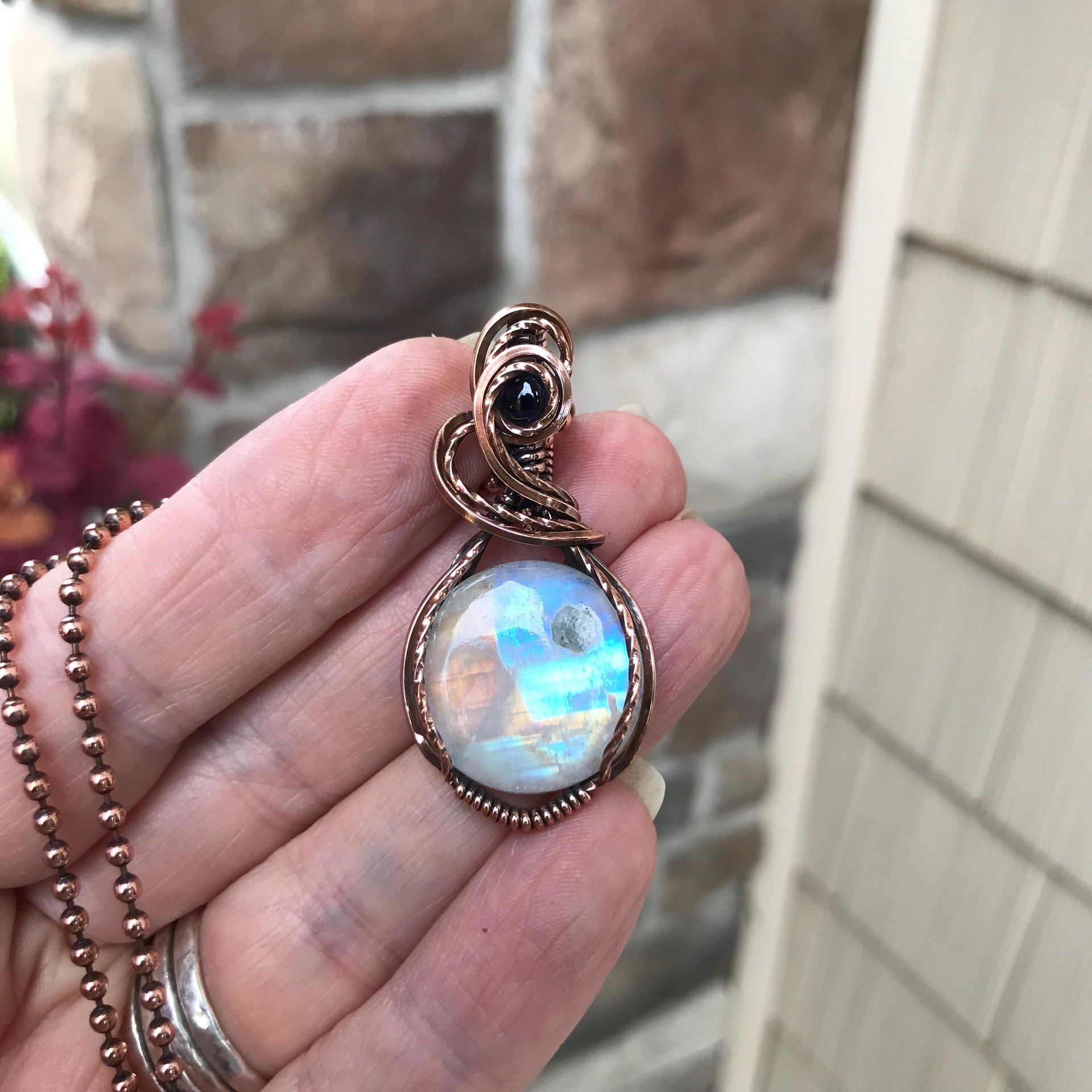 Rainbow moonstone & iolite copper wire wrapped necklace,  Artisan blue orange crystal pendant