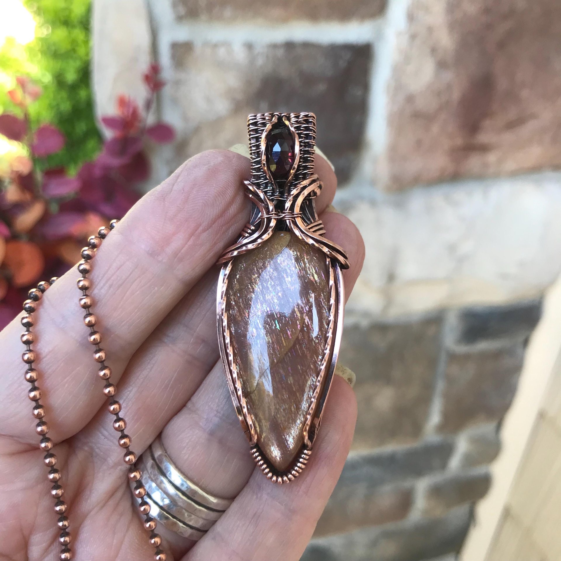 Golden Sunstone & Garnet Copper Pendant with Weaving